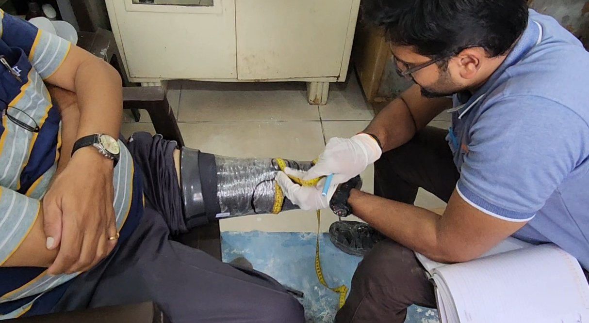 Mr. Utsav Basutkar while taking the measurement