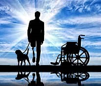 Image of a person standing with prosthetic leg along with his dog