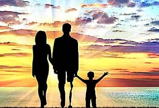 image of a person standing with prosthetic leg along with his family